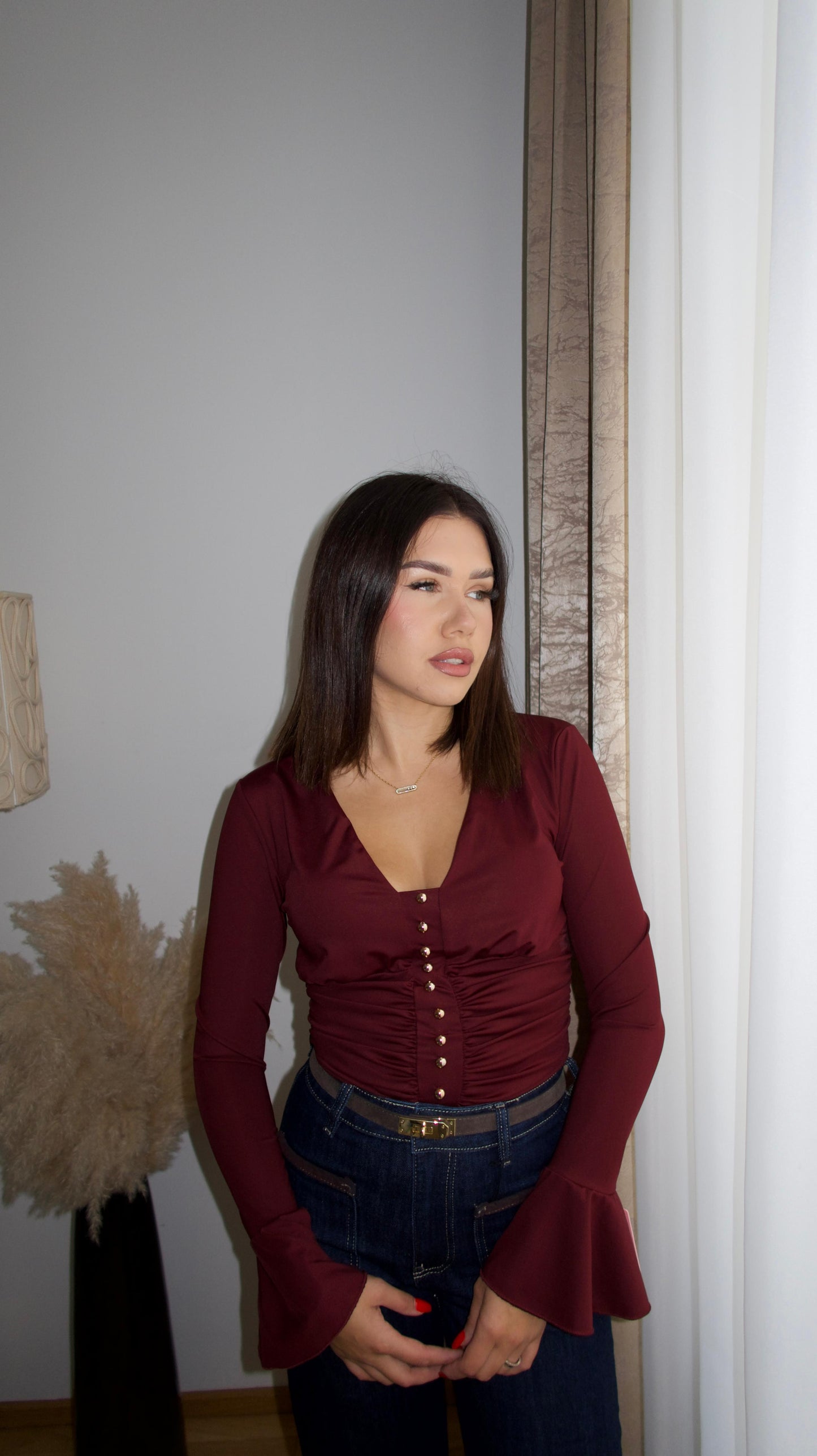 Body with gold buttons